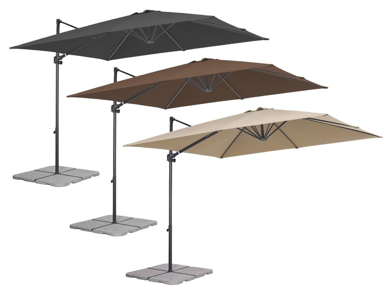 Drei Hängeschirme in Grau, Braun und Beige mit Steinsockel.