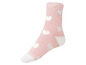 Rosa Socke mit weißen Herzen