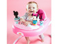 Baby in einem rosa Bright Starts Lauflernwagen mit Minnie Mouse Motiv.