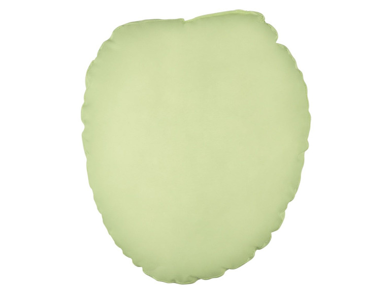 Ein hellgrünes Kissen in Herzform.