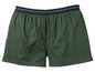 Grüne Boxershorts mit Knöpfen.