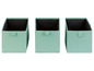 Drei mintfarbene Aufbewahrungsboxen.