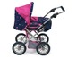 Ein rosa und blauer Kinderwagen mit Sternenmuster.