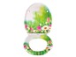 Toilettendeckel mit Blumenmuster.