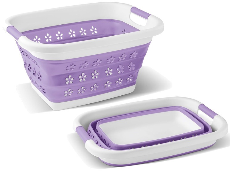 Zwei lilafarbene Wäschekörbe mit weißen Rändern und Blumendesign.