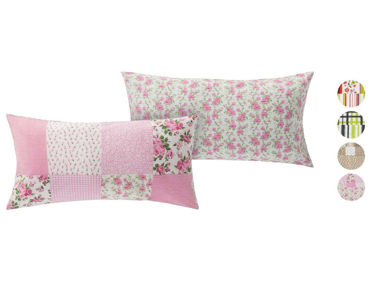 Zwei Kissenbezüge mit rosafarbenem Blumenmuster