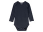 Ein dunkelblauer Lupilu Baby-Body mit langen Ärmeln.