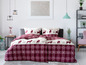 Bettwäsche mit rotem Karomuster und Rentier-Motiv