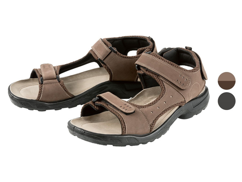 Zwei Paar braune Ledersandalen mit Klettverschluss.