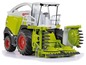 Ein Claas Jaguar Forager Spielzeugmodell mit rotierendem Mähwerk.