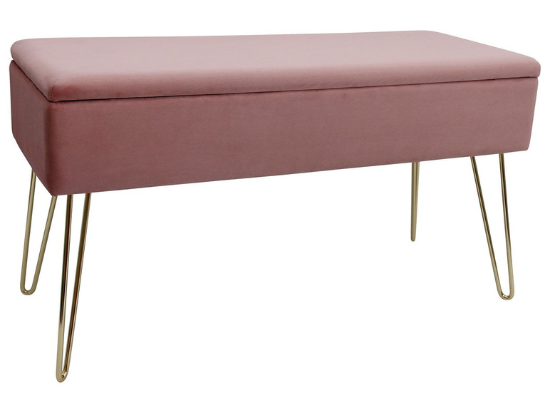 Eine rosa Samtbank mit goldenen Beinen.