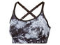 Ein schwarzer Sport-BH mit Tie-Dye-Muster.