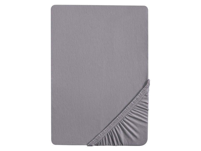 Ein graues Spannbettlaken.