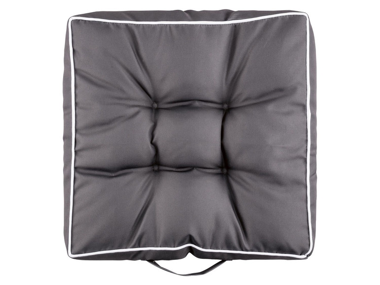 Graues Sitzkissen mit weißem Besatz.