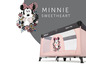 Ein rosa Reisebett mit Minnie Mouse Design von Hauck.