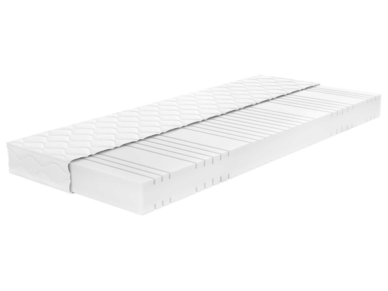 Eine weiße Matratze mit einem abnehmbaren Bezug.