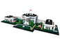 Lego-Modell des Weißen Hauses mit Bäumen und Blumen.