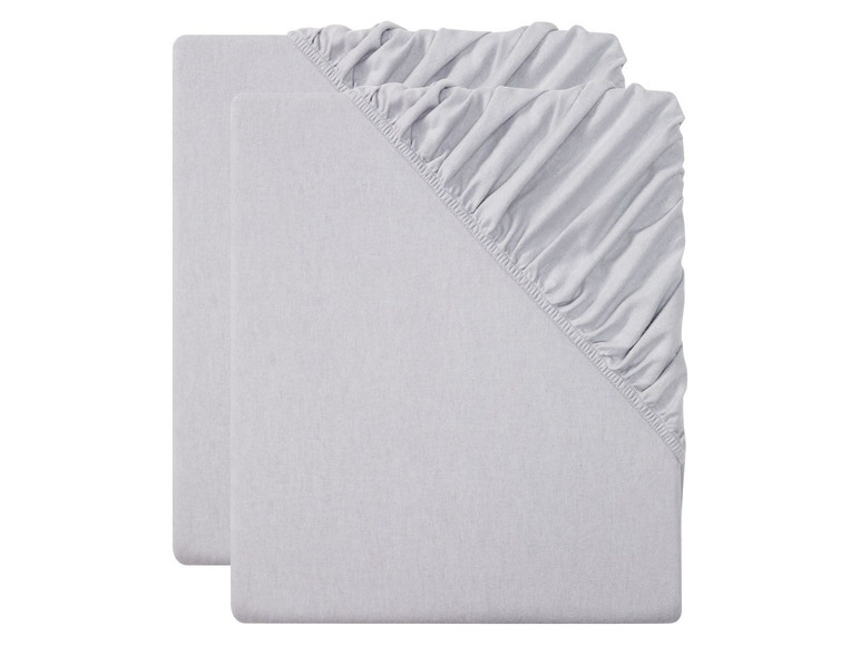 Zwei graue Spannbettlaken.