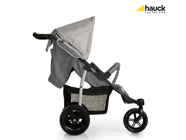 Ein grauer Hauck Kinderwagen mit großen Rädern.