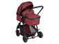 Ein roter Safety 1st Kinderwagen mit einer Babywanne und einem Einkaufskorb.