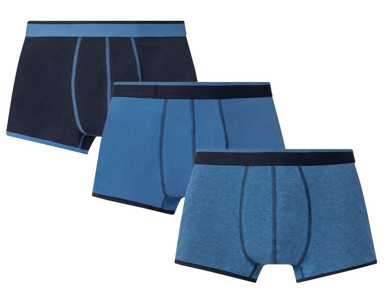 Drei blaue Boxershorts mit dunkelblauen Akzenten.