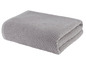 Ein gefaltetes graues Handtuch.