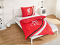 Ein Bett mit Liverpool FC Bettwäsche.
