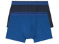 Zwei Paar blaue Boxershorts