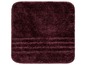 Ein dunkelroter Badezimmerteppich mit weichem Flor.