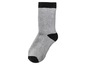 Graue Socke mit schwarzen Akzenten.