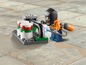 LEGO Minifigur mit Schweißgerät an einer Fabrik mit Tanks