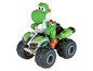 Yoshi auf einem grünen Quad, ein Spielzeugfahrzeug.
