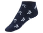 Eine dunkelblaue Socke mit weißen Palmen.