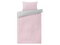 Rosa Bettbezug mit weißen Punkten.