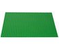 Eine grüne LEGO Grundplatte zum Bauen von Konstruktionen.