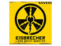 Ein schwarzes Warnschild mit Blitz auf gelbem Hintergrund mit dem Text 'Eisbrecher - Liebe macht Monster'.