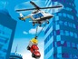 Ein LEGO City Polizeihubschrauber mit einem kleinen LKW