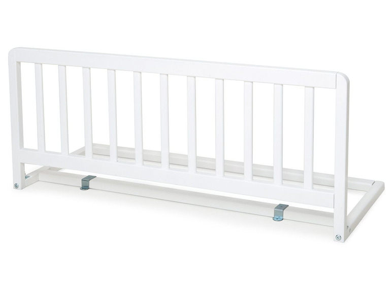 Weißes Bettgitter für ein Kinderbett.