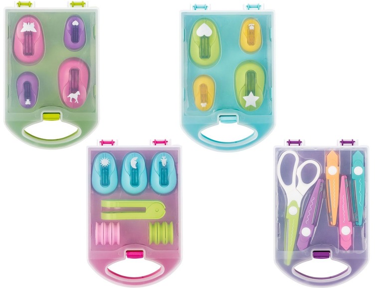 Stanzformen, Scheren und anderes Bastelzubehör in Aufbewahrungsboxen.