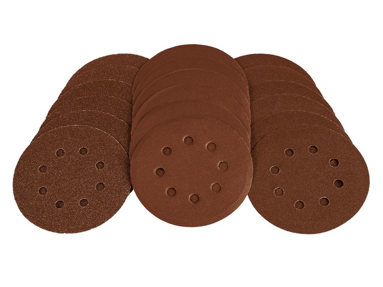 Ein Satz runder Schleifblätter mit Löchern.