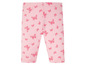 Rosa Leggings mit Schmetterlingsmuster.