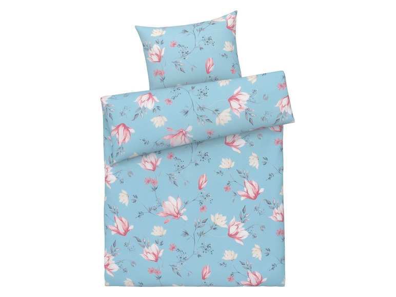 Eine blaue Bettwäsche mit rosa Blumen.