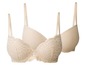 Zwei beige BHs, einer mit Spitze und einer glatt.