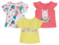 Drei Baby-T-Shirts mit Blumenmuster, einem Lama und dem Text 'have a lovely day and be happy'.