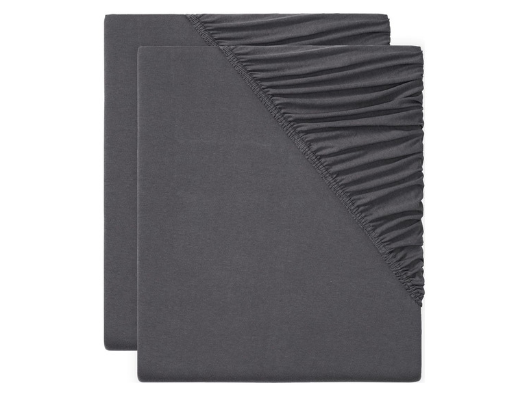 Zwei dunkelgraue Spannbettlaken für eine Matratze.