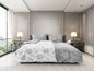 Graue Bettwäsche mit Blumenmuster in einem modernen Schlafzimmer.