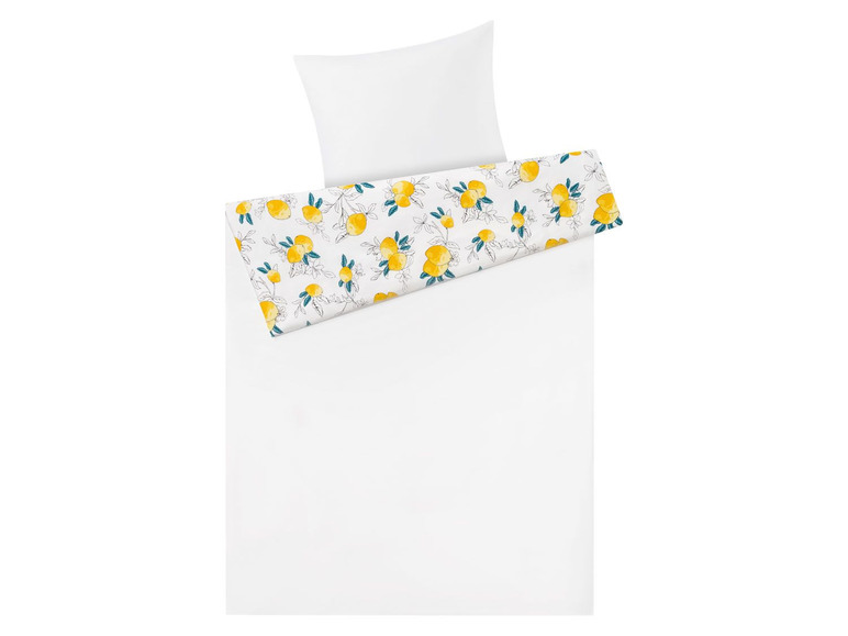 Weiße Bettwäsche mit einem Muster aus gelben Zitronen