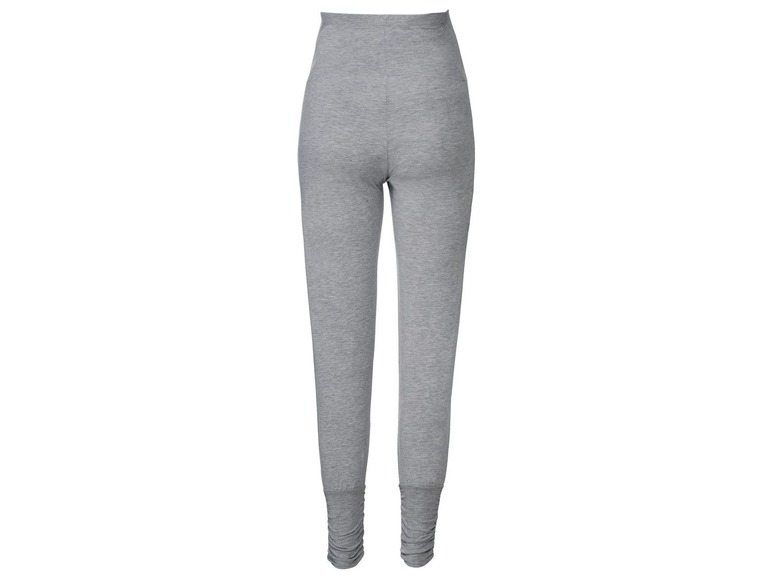 Graue Leggings mit Bündchen am Saum.