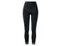 Schwarze Leggings mit Spitze am Saum.