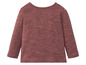 Ein rotbraunes Langarmshirt für Babys.